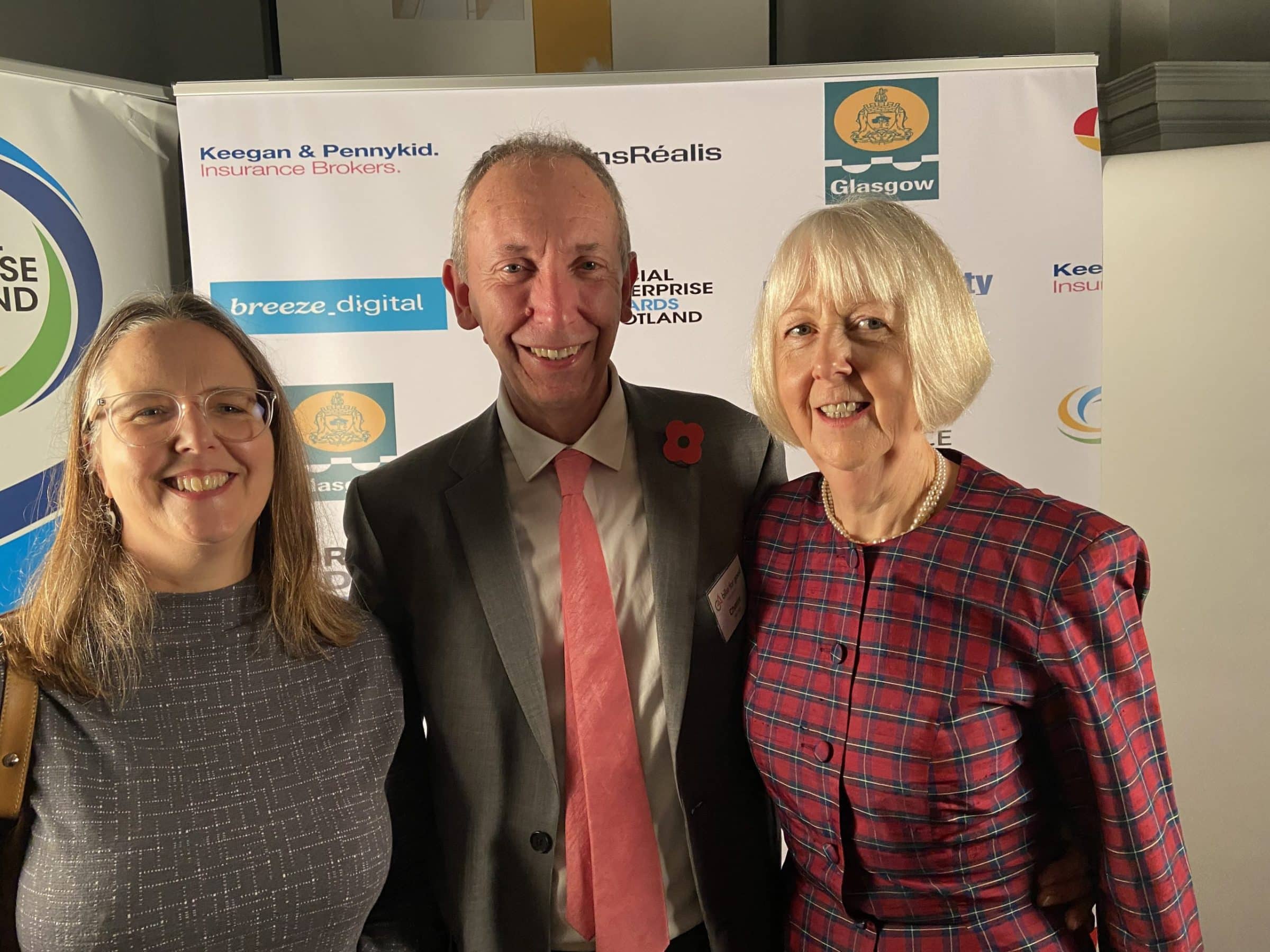 Social Enterprise Volunteer Champion award winner Charlie Woodward standing with Bike for Good CEO alberta Gutteridge after collecting his award.
